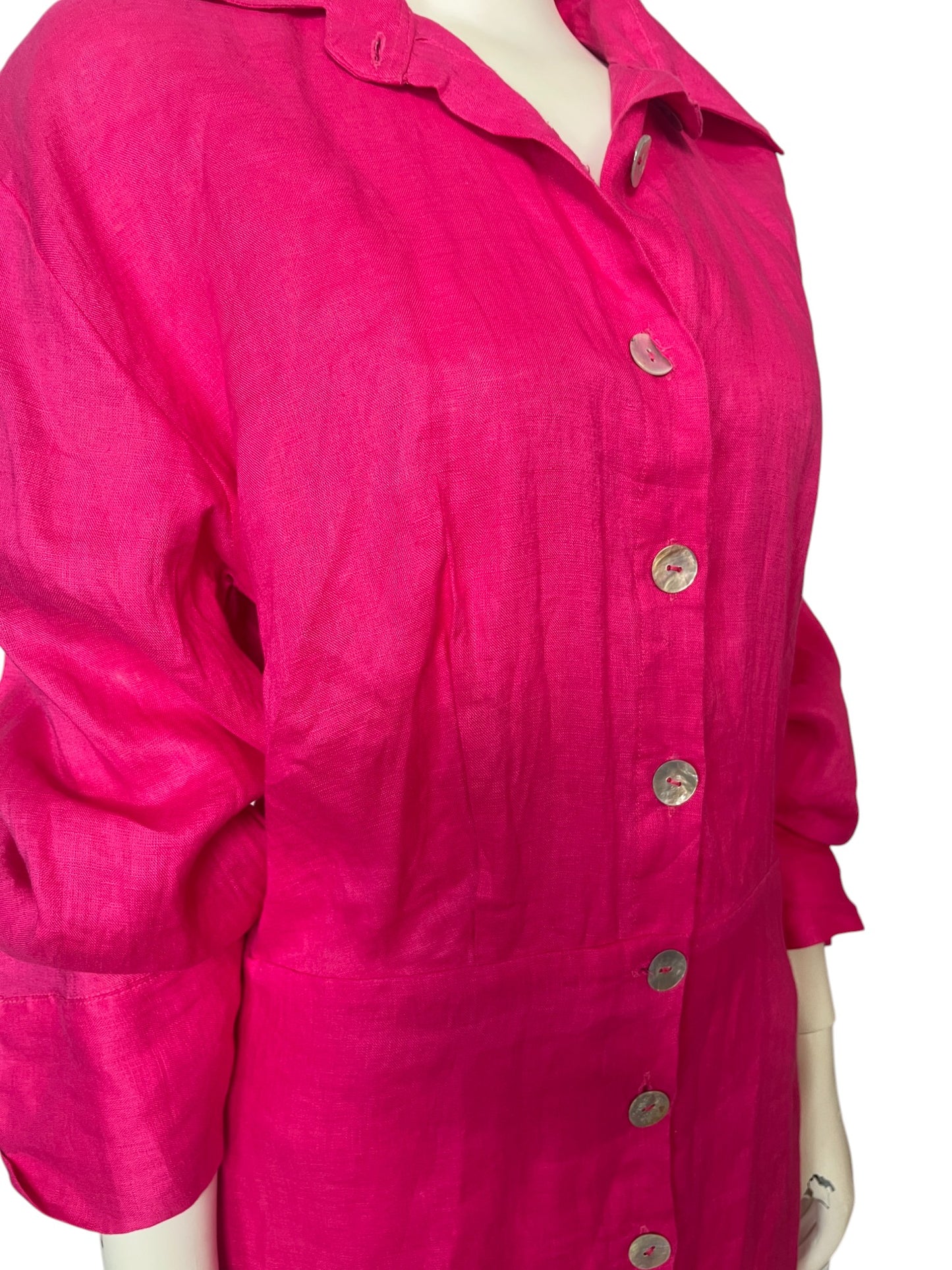 Vestido mini fucsia con mangas