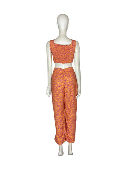 Jumpsuit naranja con flores fucsia