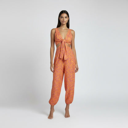 Jumpsuit naranja con flores fucsia