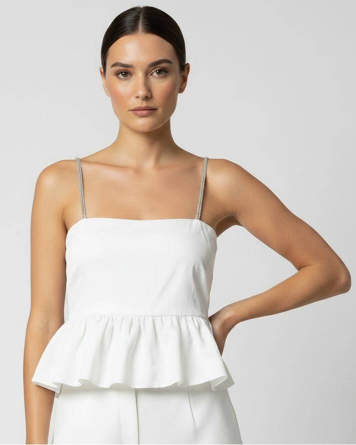 Top blanco con piedras