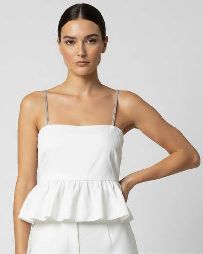Top blanco con piedras